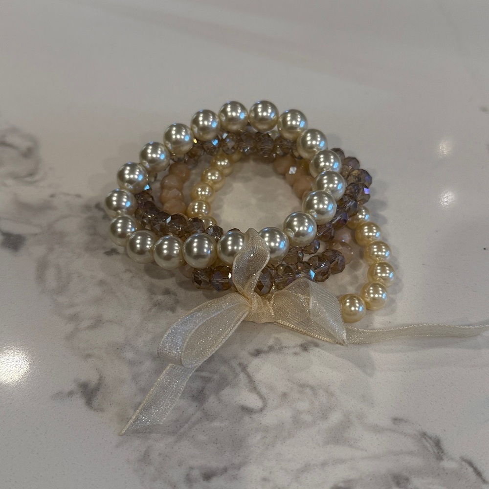 Neutral beaded bracelet set of 4. Never worn.
